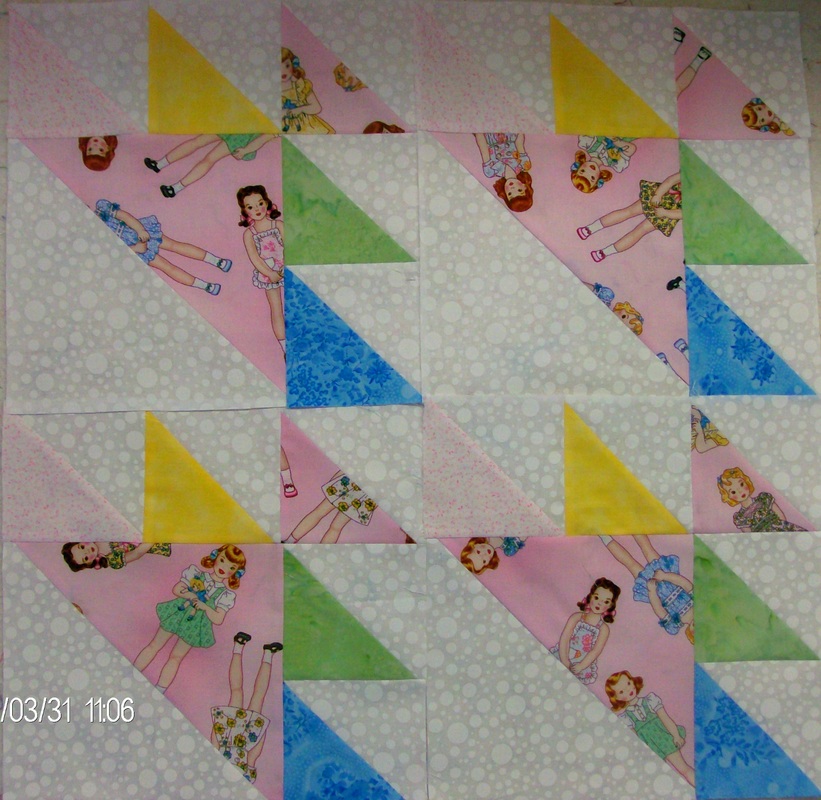 Quilting Blog blogging about the West Wind quilt block and sewng four blocks together.