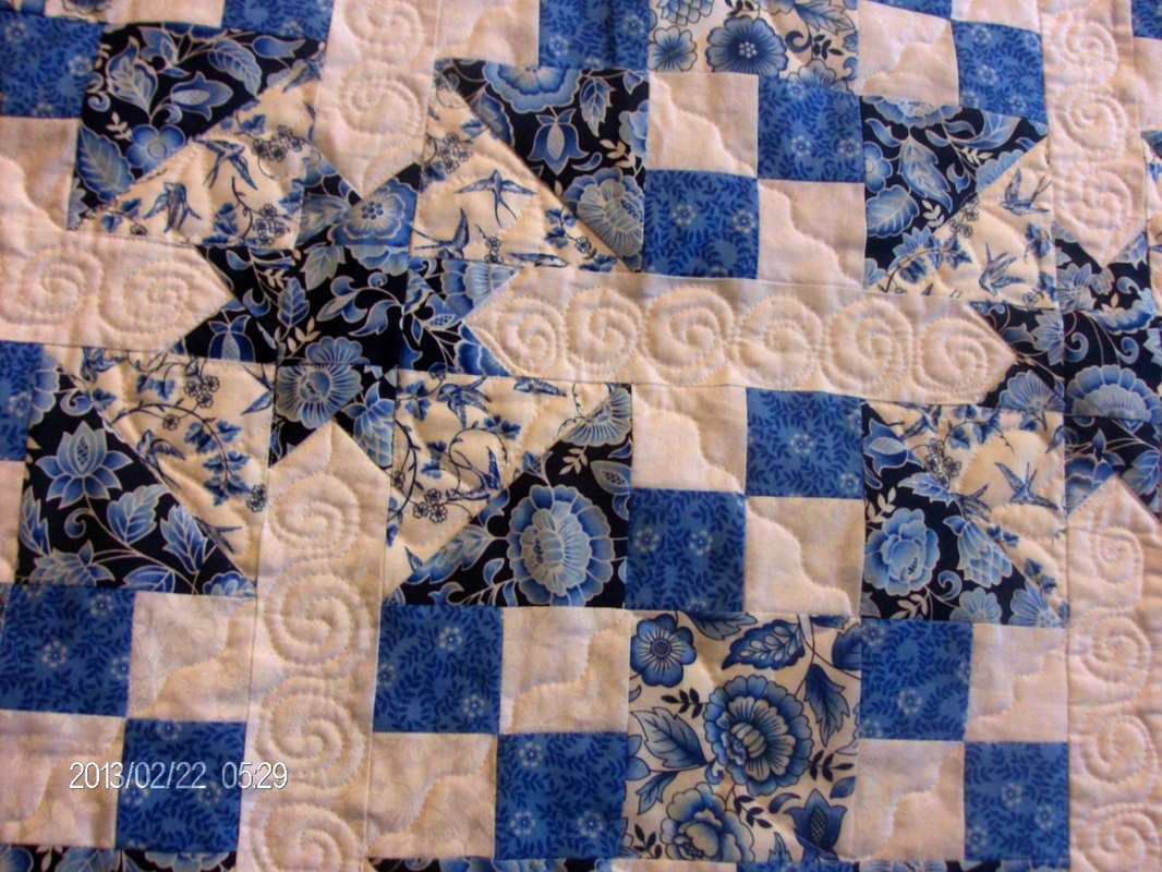 Blogging about the true blue quilt block and the finished product.