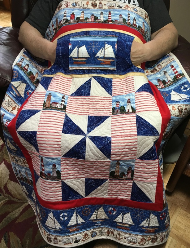 Lighthouse Lovie Lap Quilt with Pockets, handmade wheelchair blanket from http://www.HomeSewnByCarolyn.com