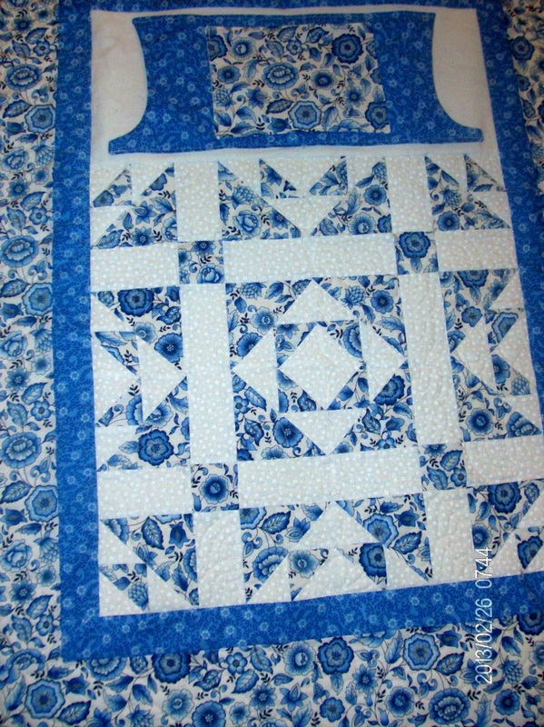Beautiful blue and white lap quilt from Homesewn by Carolyn