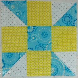 Calico Puzzle Baby Quilt by Homesewn by Carolyn, lap quilt