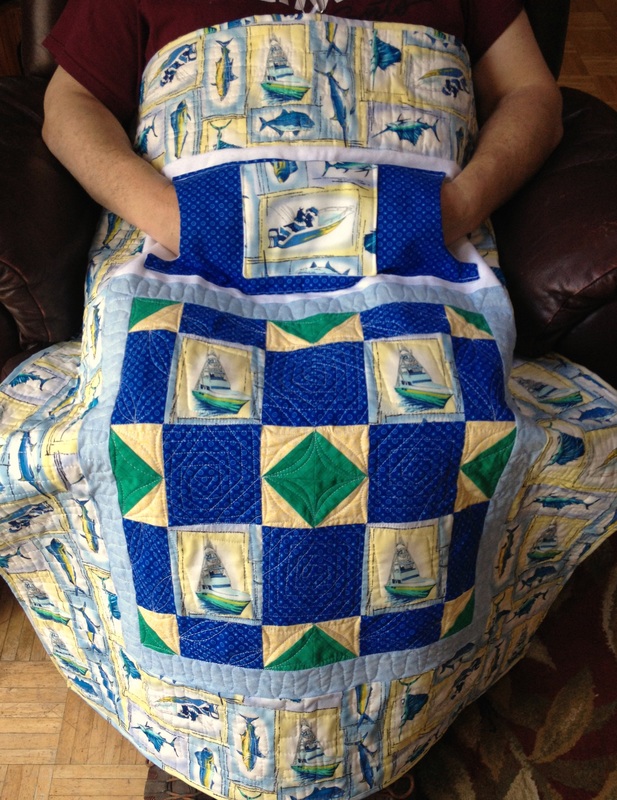 Gone Fishing Lap Quilt with Pockets.  Great gift for Dad or Grandpa.  To purchase - http://www.homesewnbycarolyn.com, click on Lovie Lap Quilts!