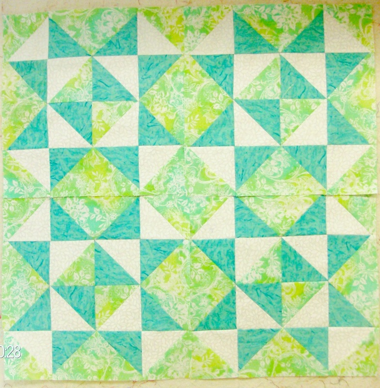 Quilt Blog by Homesewn by Carolyn speaking about four quilt blocks sewn together of the Wheel of Time quilt block.