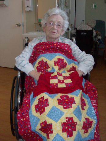 My Grandmother with her Lovie Lap Quilt with Pockets.  I designed this quilt especially for my Grandmother.  http://www.homesewnbycarolyn.com
