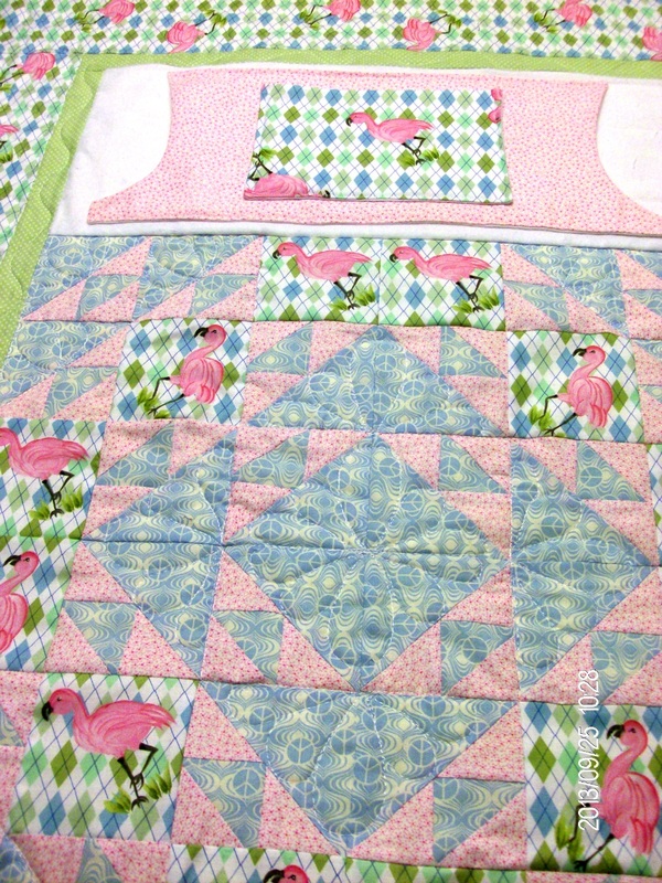 Beautiful handmade lap quilt with pockets.