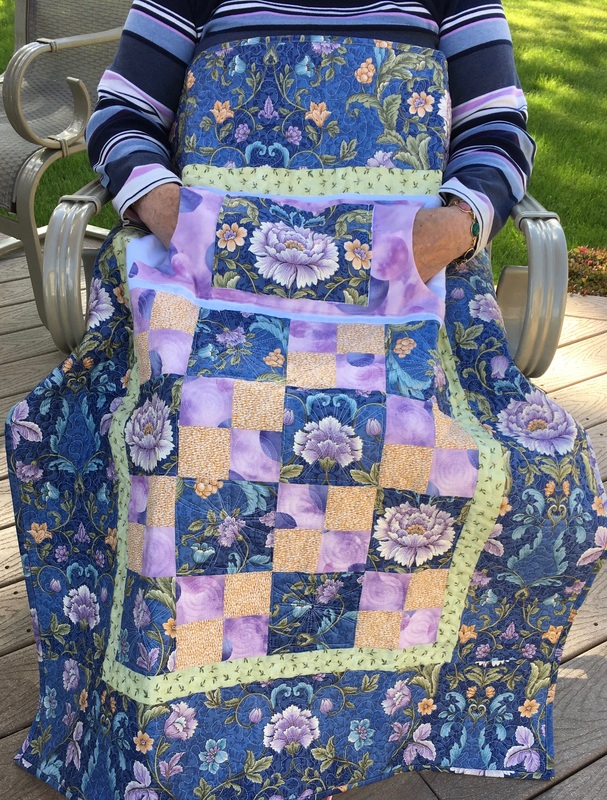 Beautiful Lovie Lap Quilt with Pockets for sale from http://www.HomeSewnByCarolyn.com