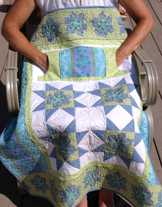 Lovie Lap Quilt with Pockets from http://www.homesewnbycarolyn.com