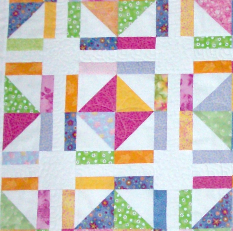 Friendship Quilt four blocks sewn together from Homesewn by Caroyn.
