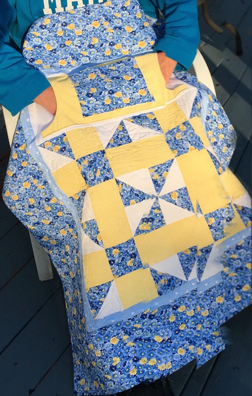 BLUE AND YELLOW LOVIE LAP QUILT WITH POCKETS from http://www.homesewnbycarolyn.com