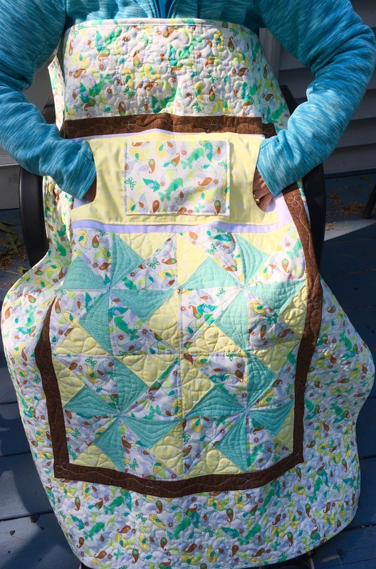 Yellow and Green Lovie Lap Quilt with Pockets, great for nursing home or wheelchairs.  Made by http://www.HomeSewnByCarolyn.com