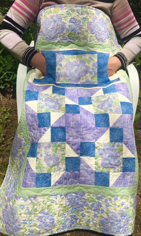 Floral Lilac Lovie Lap Quilt with Pockets from http://www.HomeSewnByCarolyn.com
