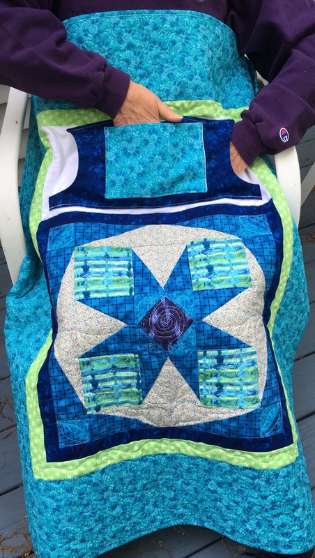 Handmade Wheelchair lap quilt with pockets from http://www.HomeSewnByCarolyn.com