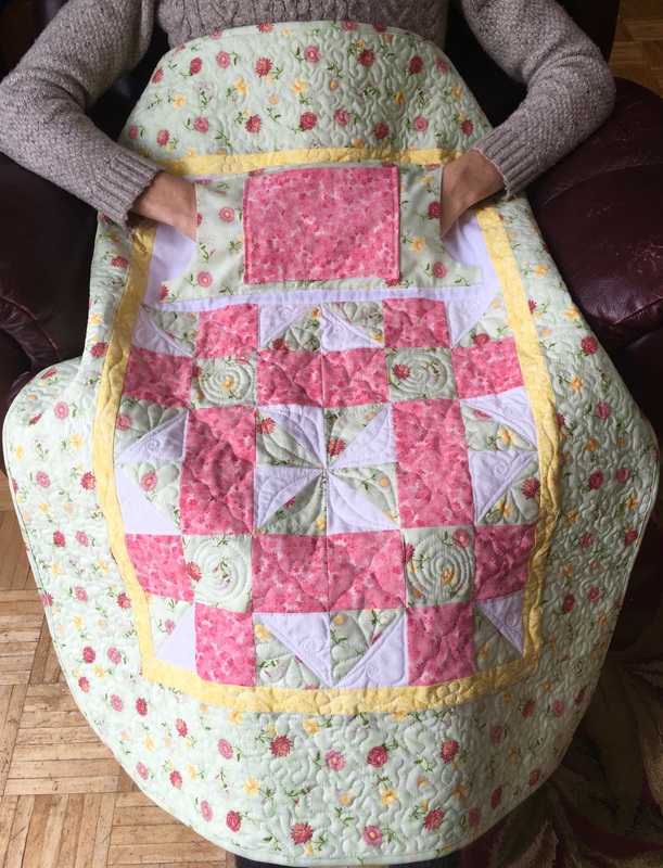 Spring Floral Lovie Lap Quilt with Pockets by http://www.HomeSewnByCarolyn.com