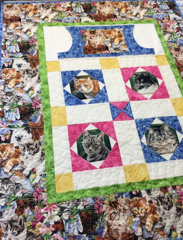 Cat Lovie Lap Quilt with Pockets from http://www.HomeSewnByCarolyn.com