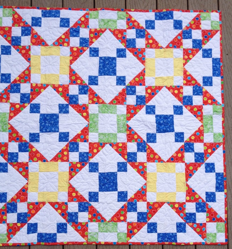 Primary colors baby quilt from http://www.homesewnbycarolyn.com