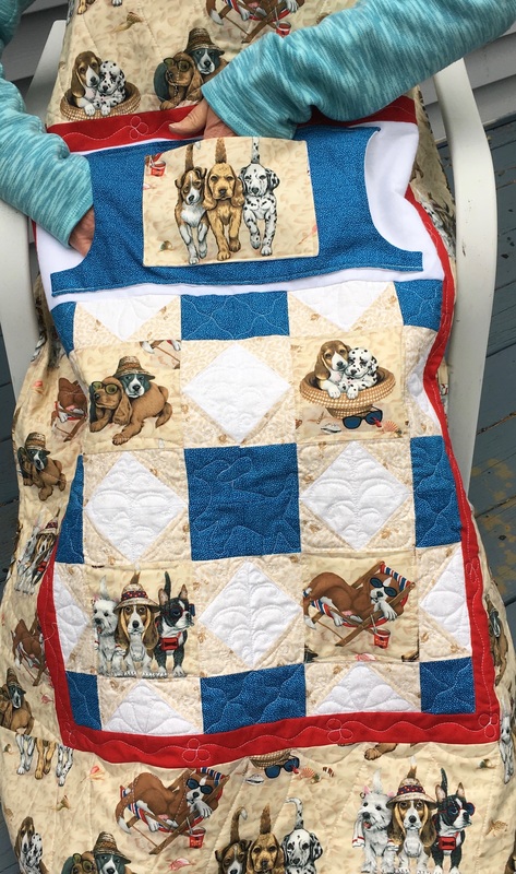 Puppy Lovie Lap Quilt with Pockets and free motion quilting from http://www.HomeSewnByCarolyn.com