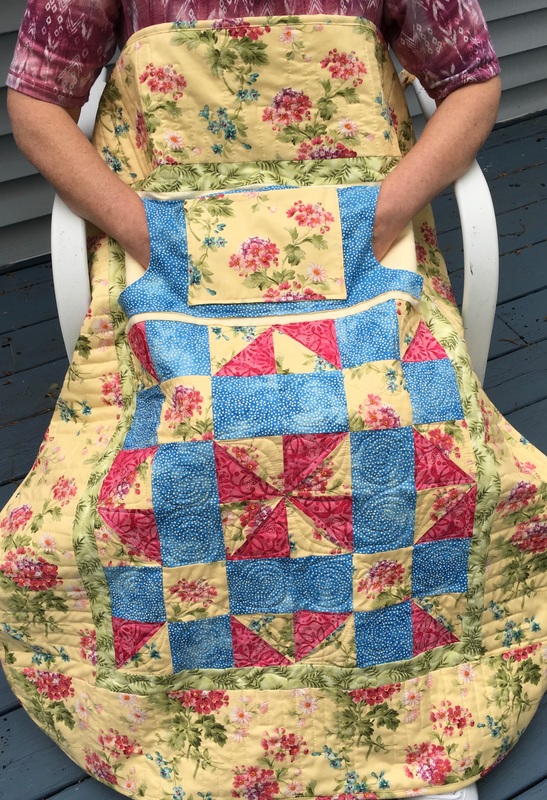 Small Floral Lovie Lap Quilt with Pockets from http://www.HomeSewnByCarolyn.com