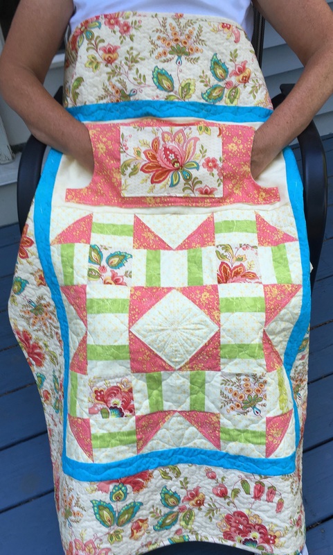 Peach Floral Lovie Lap Quilt with Pockets from http://www.HomeSewnByCarolyn.com