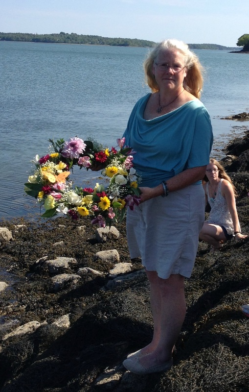 Wreath of flowers for Mom about to be launched into the ocean.