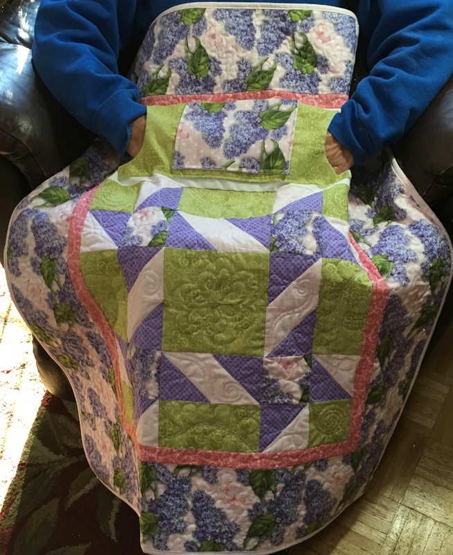 Lilac Lovie Lap Quilt with pockets, great gift for Mom or Grandma.  Purchase at http://www.homesewnbycarolyn.com