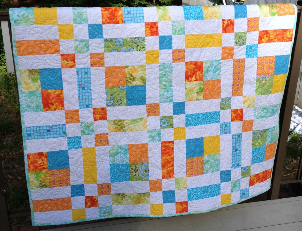 Patchwork baby quilt great for a boy or girl.
