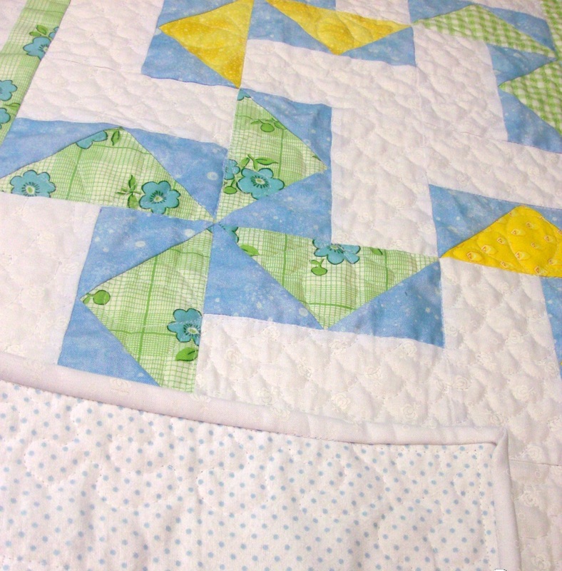 Louisiana baby quilt showing the back with a soft flannel.