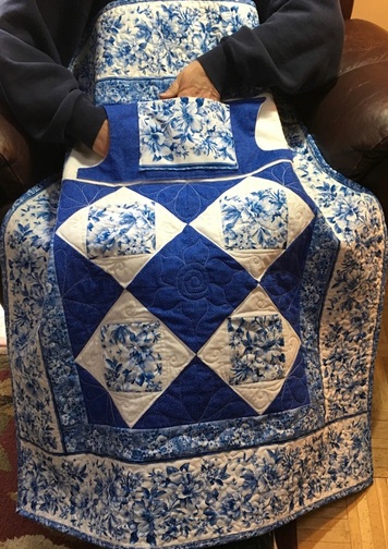 A unique lap quilt with pockets to keep your hands warm.  What a great gift for Mom or Grandma!  http://www.homesewnbycarolyn.com