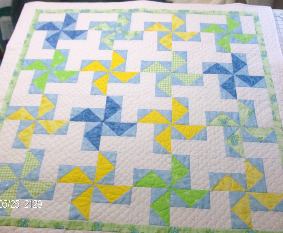 The Louisiana quilt block is made into a beautiful baby quilt.