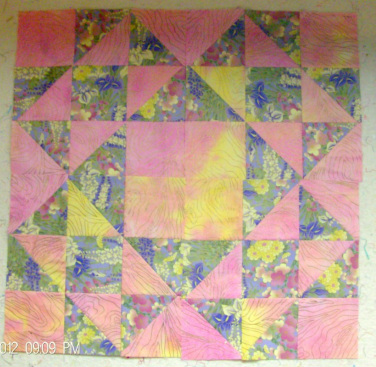 Four Quilt Blocks together of Split Nine Patch Quilt Block