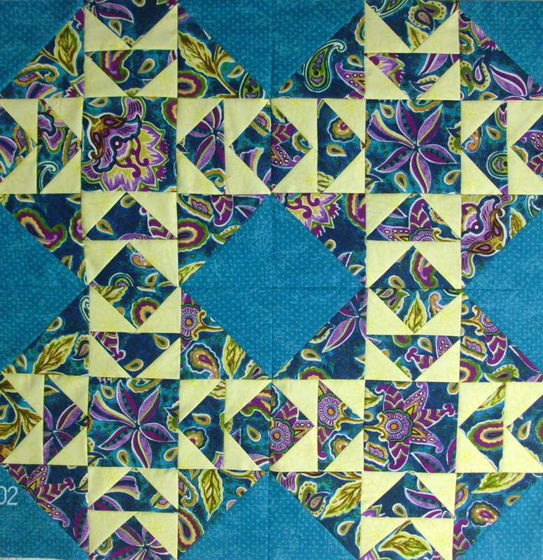 Cut the Corners four quilt blocks sewn together.