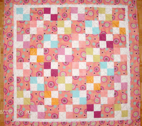 Four Patch Baby Quilt for sale at www.homesewnbycarolyn.com