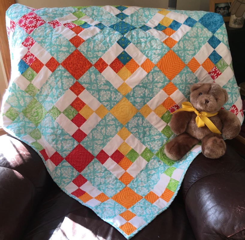 Sunny Days Baby Quilt from http://www.homesewnbycarolyn.com