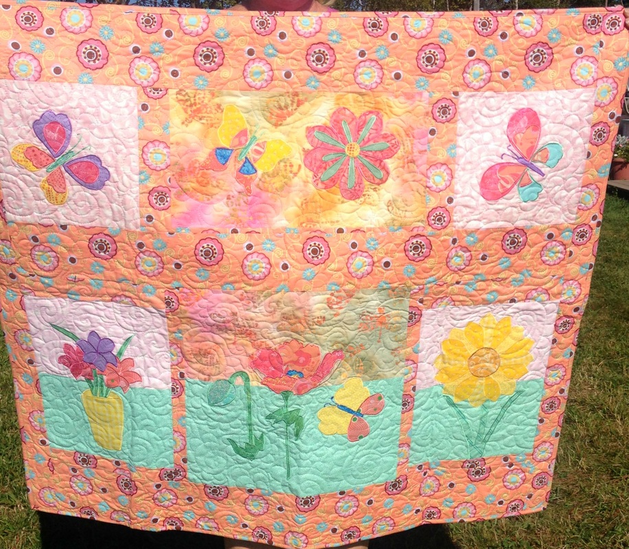 Floral Butterfly Quilt from HomeSewnByCarolyn.com