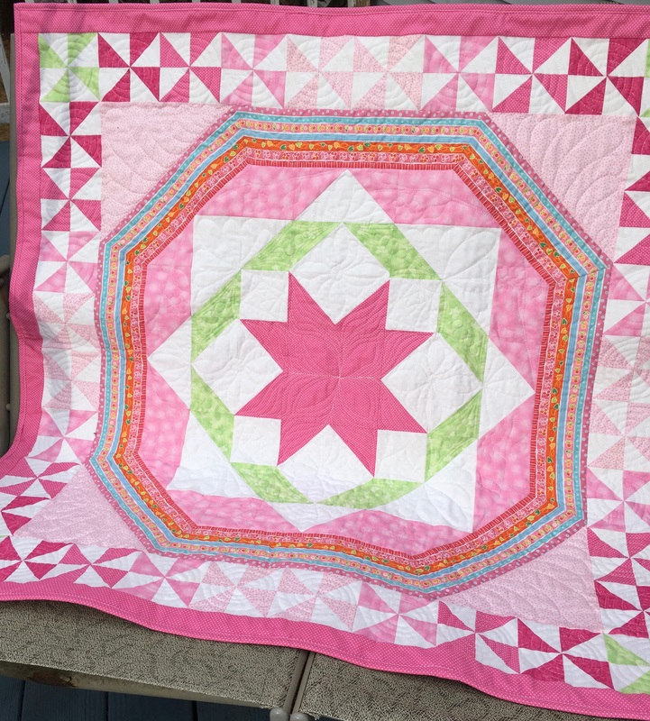 Pink Star Baby Quilt from http://www.homesewnbycarolyn.com