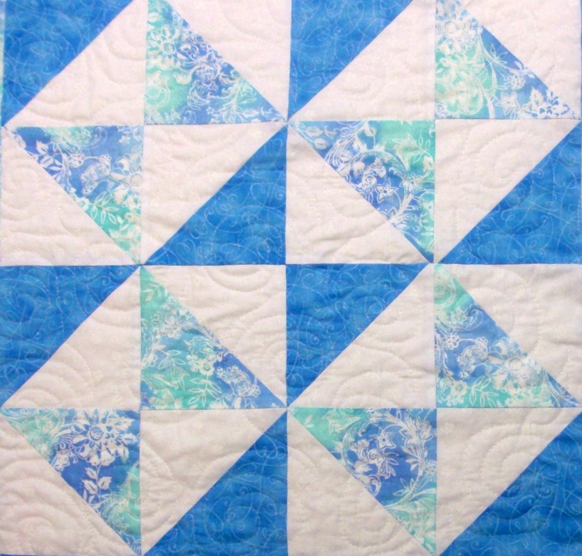 Quilting blog about four squares of the double square quilt block.