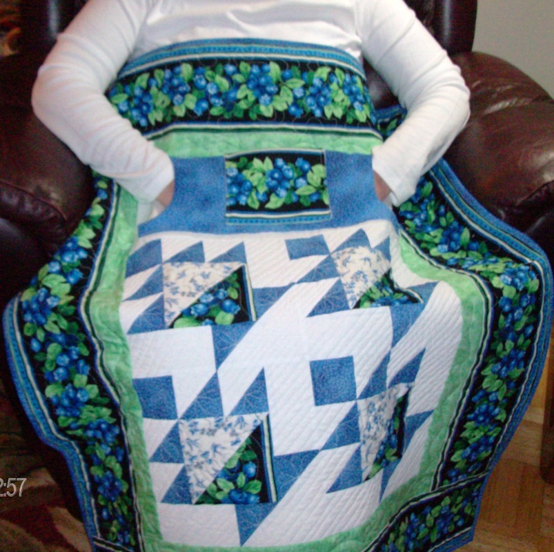 Lap quilt with pockets from HomeSewnByCarolyn