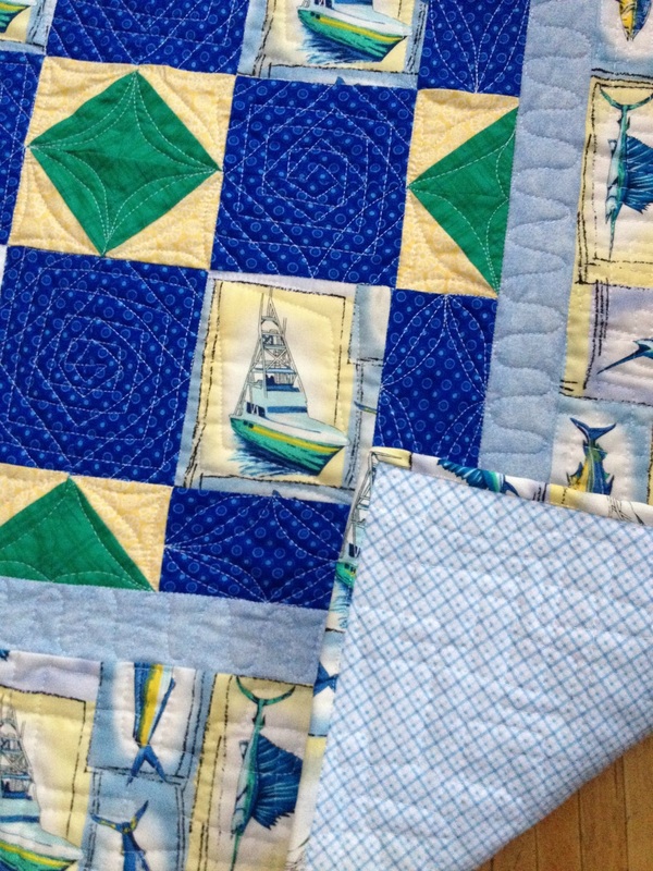 Fishing lap quilt for Dad for Father's Day from http://www.homesewnbycarolyn.com