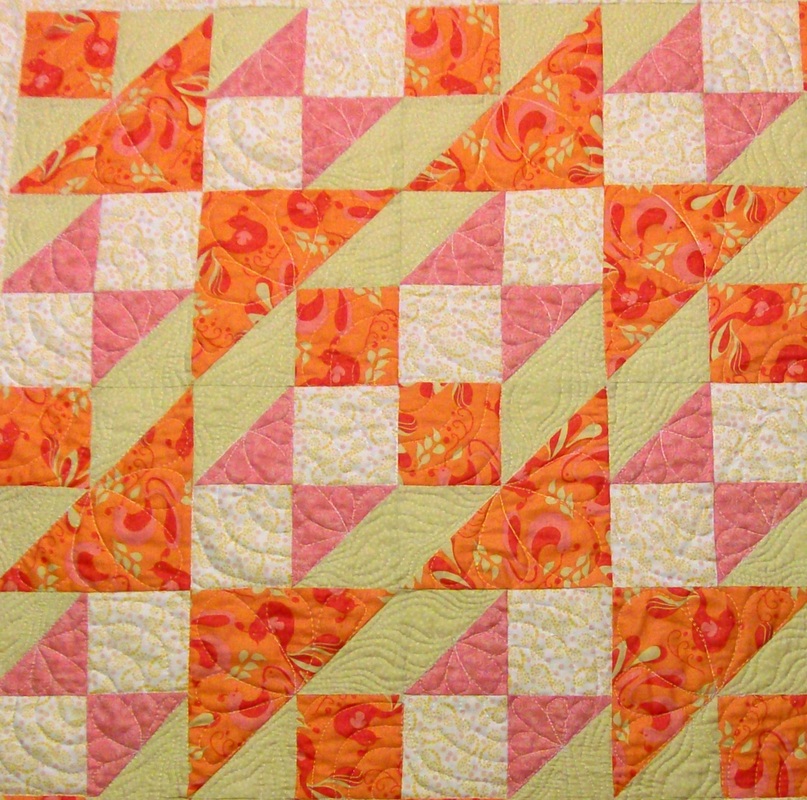 Four quilt blocks sewn together of the Double X No. 3 block showing a new design.