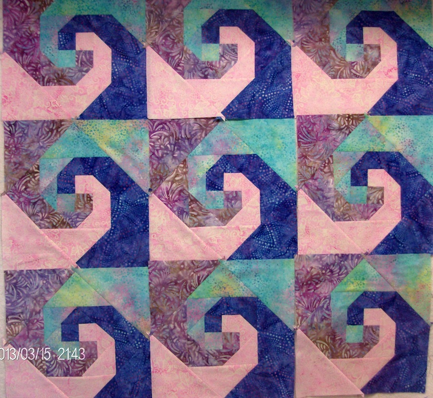 Quilt Blog from Homesewn by Carolyn showing the Snail's Trail quilt pattern.