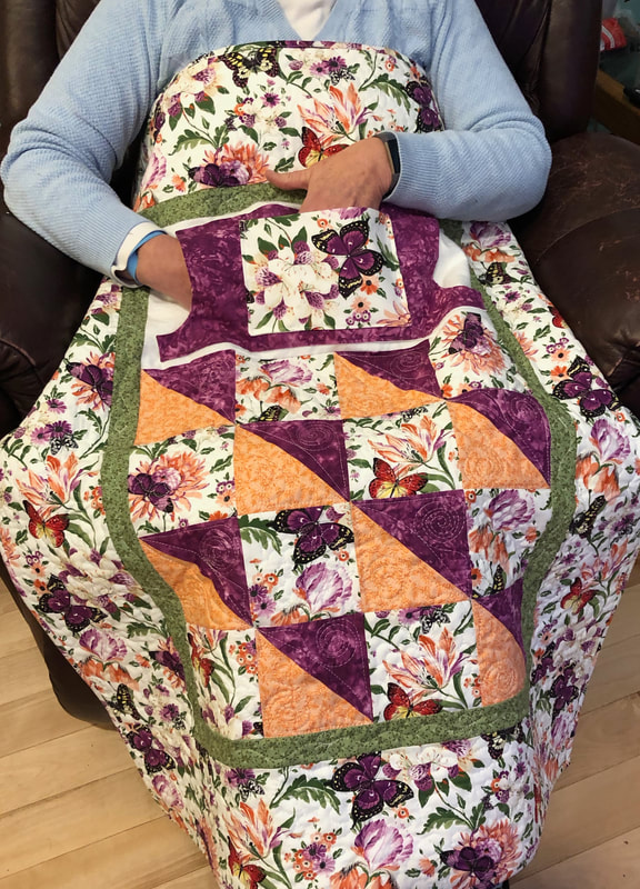 Lovie Lap Quilt with Pockets from http://www.HomeSewnByCarolyn.com 