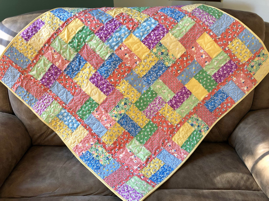 1930's Reproduction Baby Quilt for sale from http://www.HomeSewnByCarolyn.com 