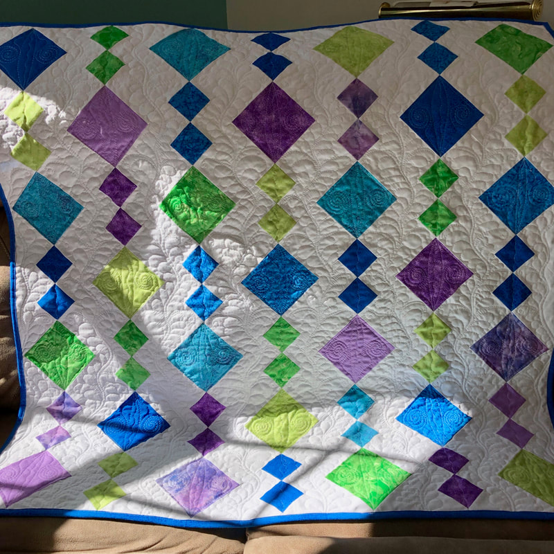 Wind Chimes Baby Quilt from http://www.HomeSewnByCarolyn.com/baby-quilts.html 