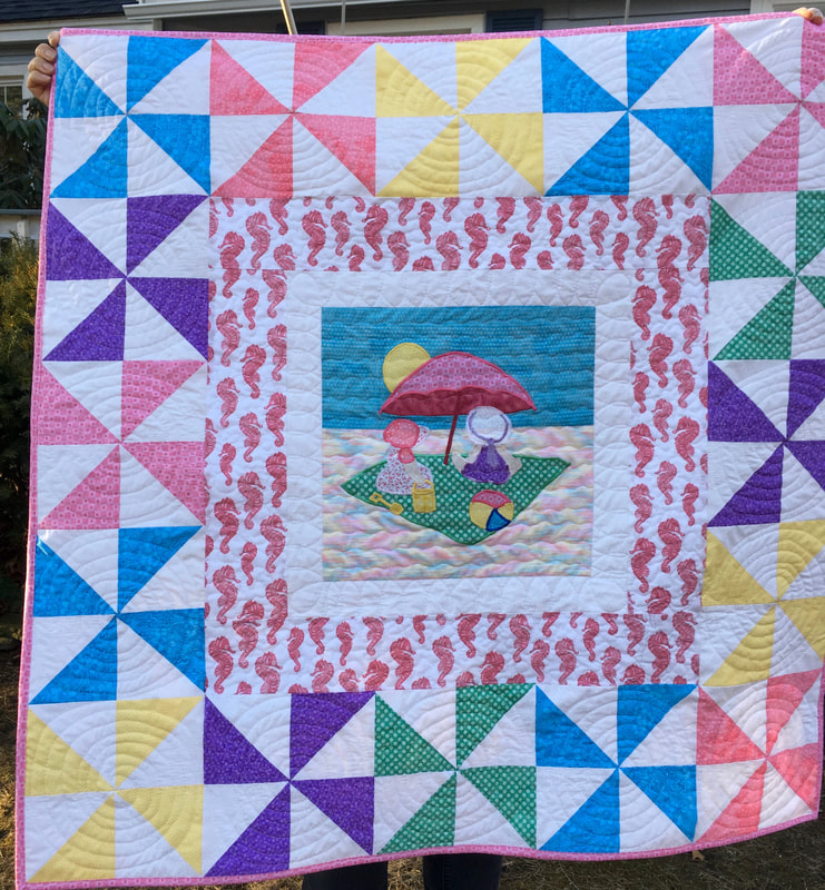A Day At the Beach Baby Quilt from http://www.HomeSewnByCarolyn.com