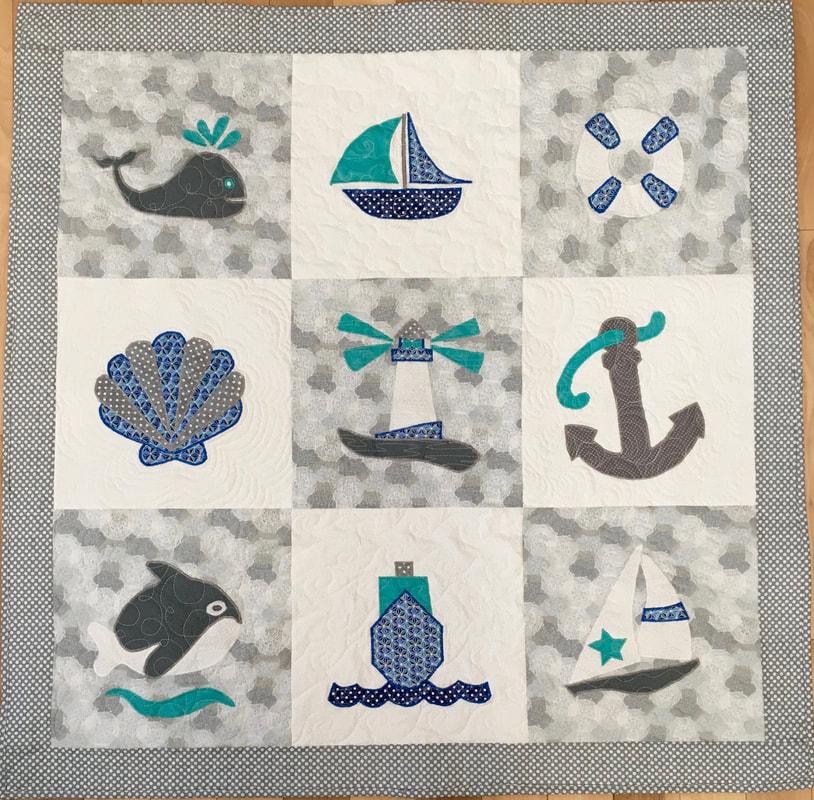 Nautical Baby Quilt in Blue, Grey and Teal from http://www.HomeSewnByCarolyn.com