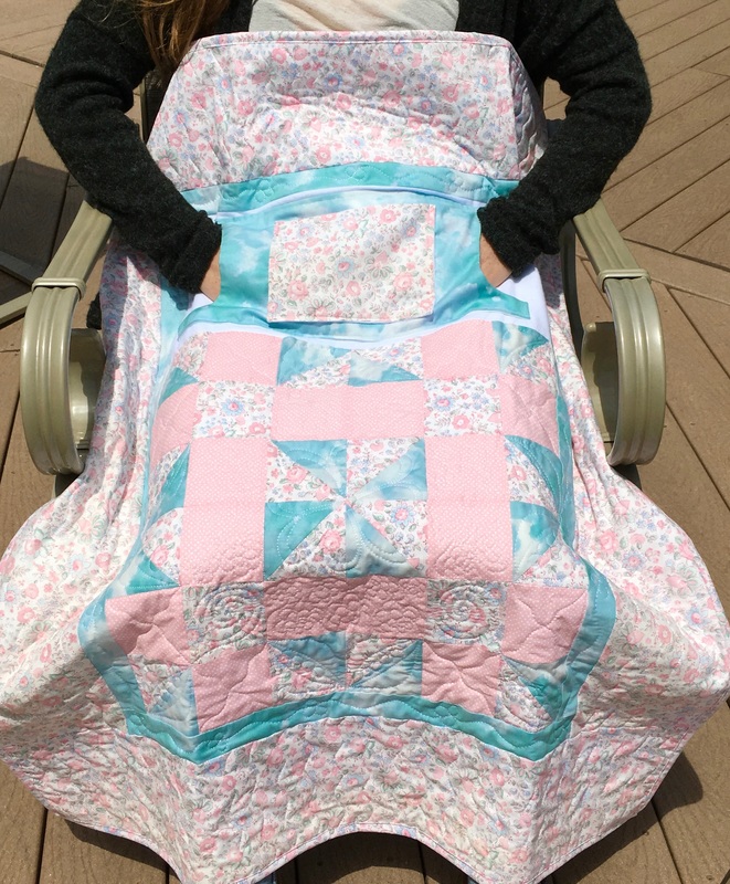 Soft Pink Floral Lovie Lap Quilt with Pockets from http://www.HomeSewnByCarolyn.com