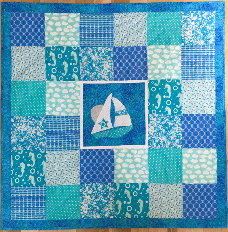 Sailboat Baby Quilt from http:///www.HomeSewnByCarolyn.com