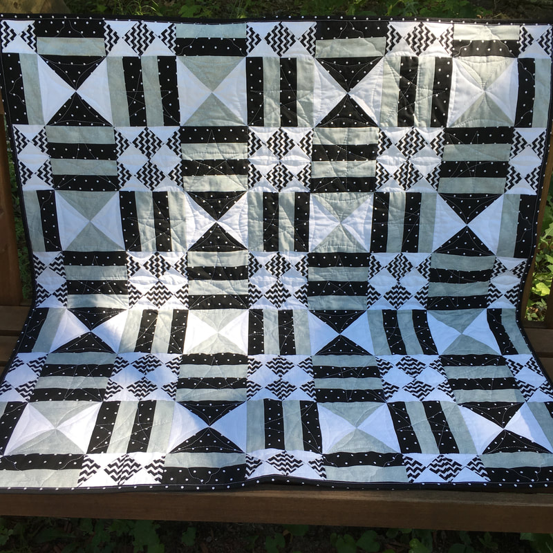 Black, White and Grey Baby Quilt from http://www.HomeSEwnByCarolyn.com