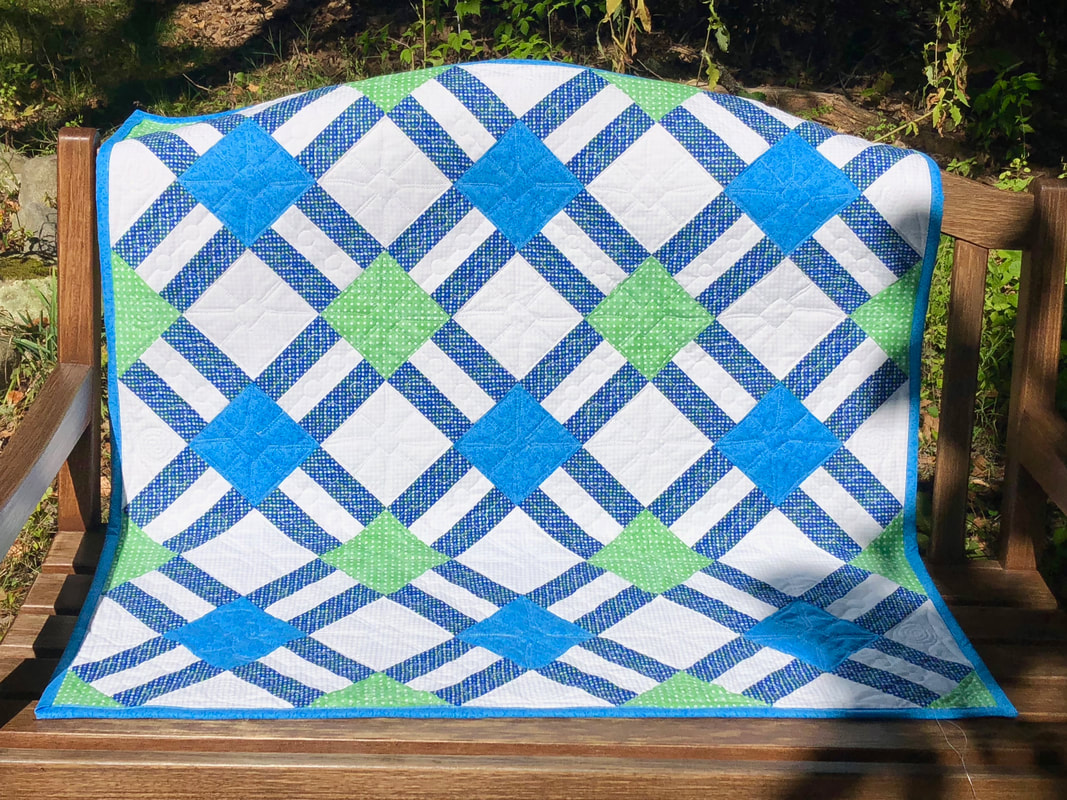 Blue and Green Baby Boy Quilt for sale from http://www.HomeSewnByCarolyn.com/baby-quilts.html