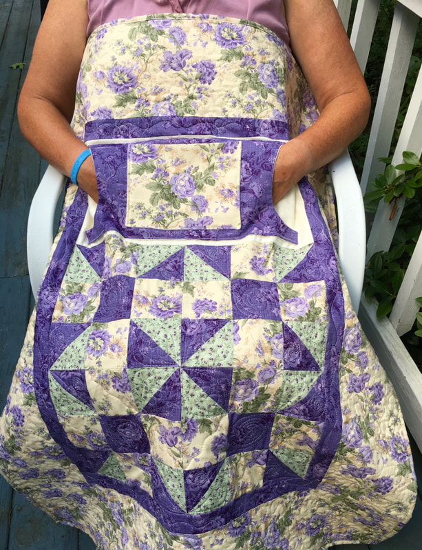Lavender Rose Lovie Lap Quilt with Pockets from http://www.HomeSewnByCarolyn.com 