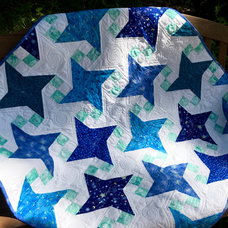 Milky Way Baby Quilt for sale from http://www.HomeSEwnByCarolyn.com